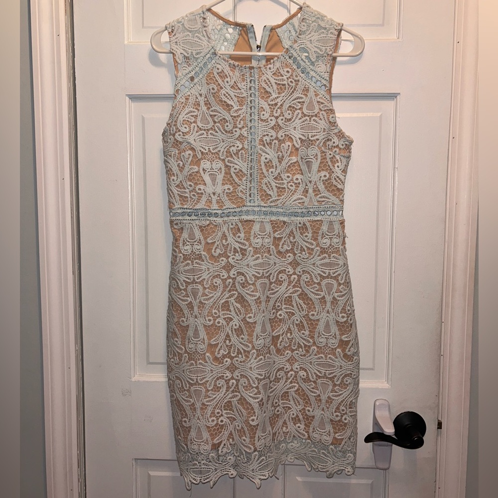 Lulus size M white with slight tint with tan layer underneath